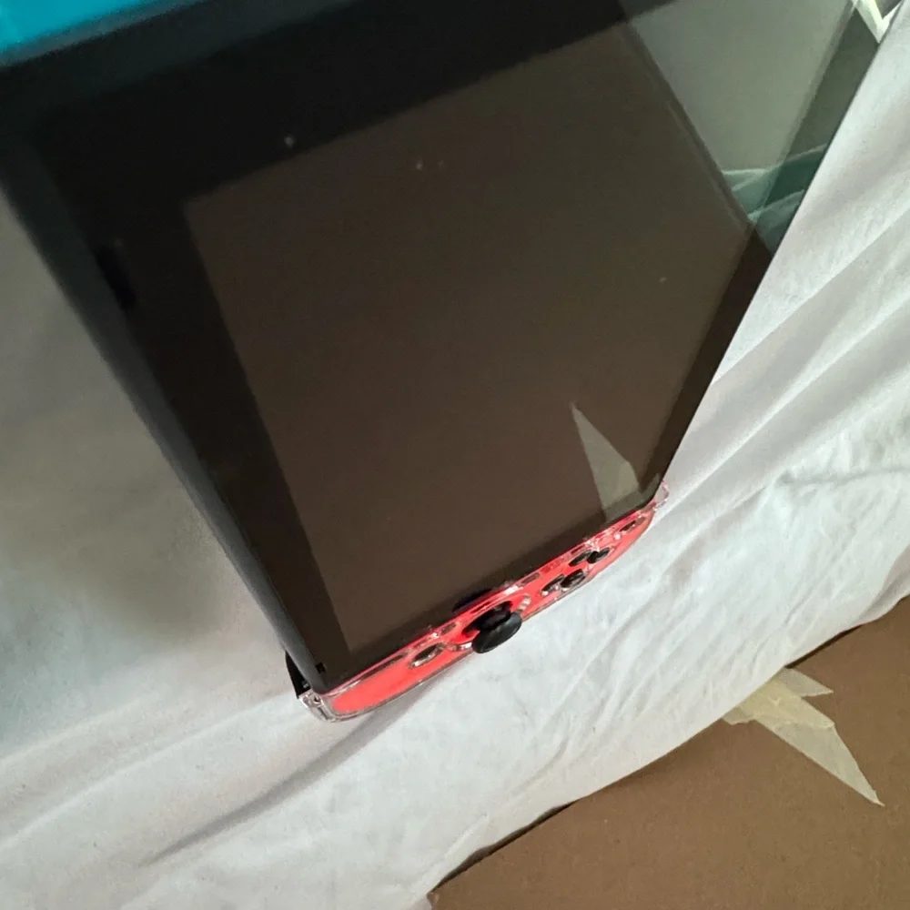 Nintendo Switch with Neon Blue and Red Joy-Con